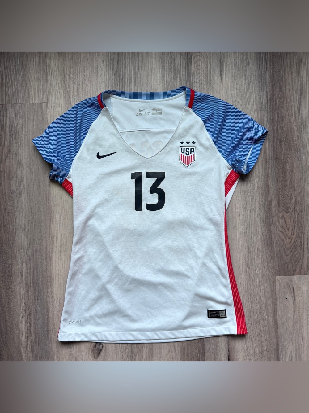 Nike Women's White Soccer Jersey with Blue Sleeves and Red Accents Alex Morgan